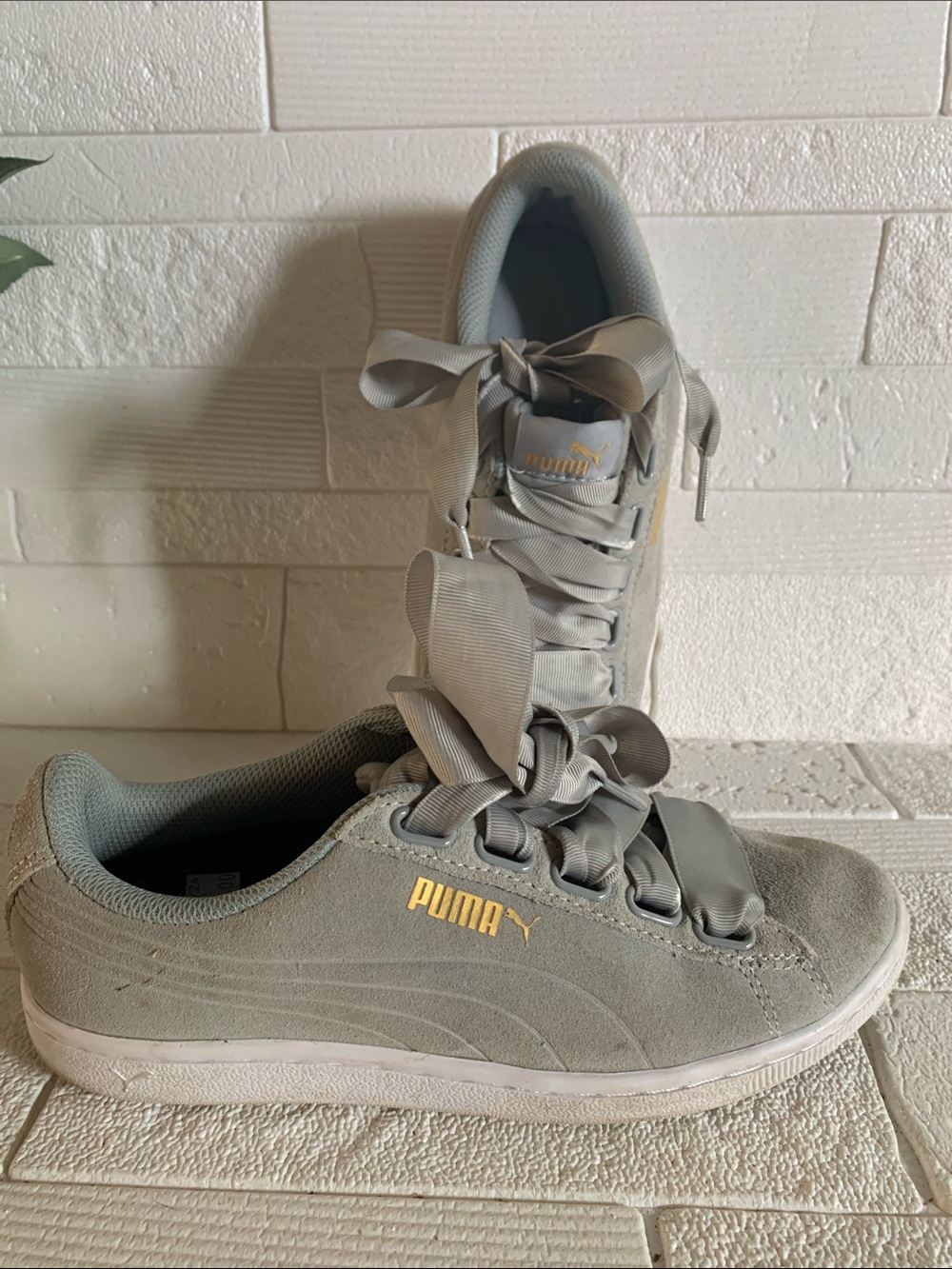 Puma Women's Suede Ribbon Lace Sneakers in Light Gray with Gold Logo